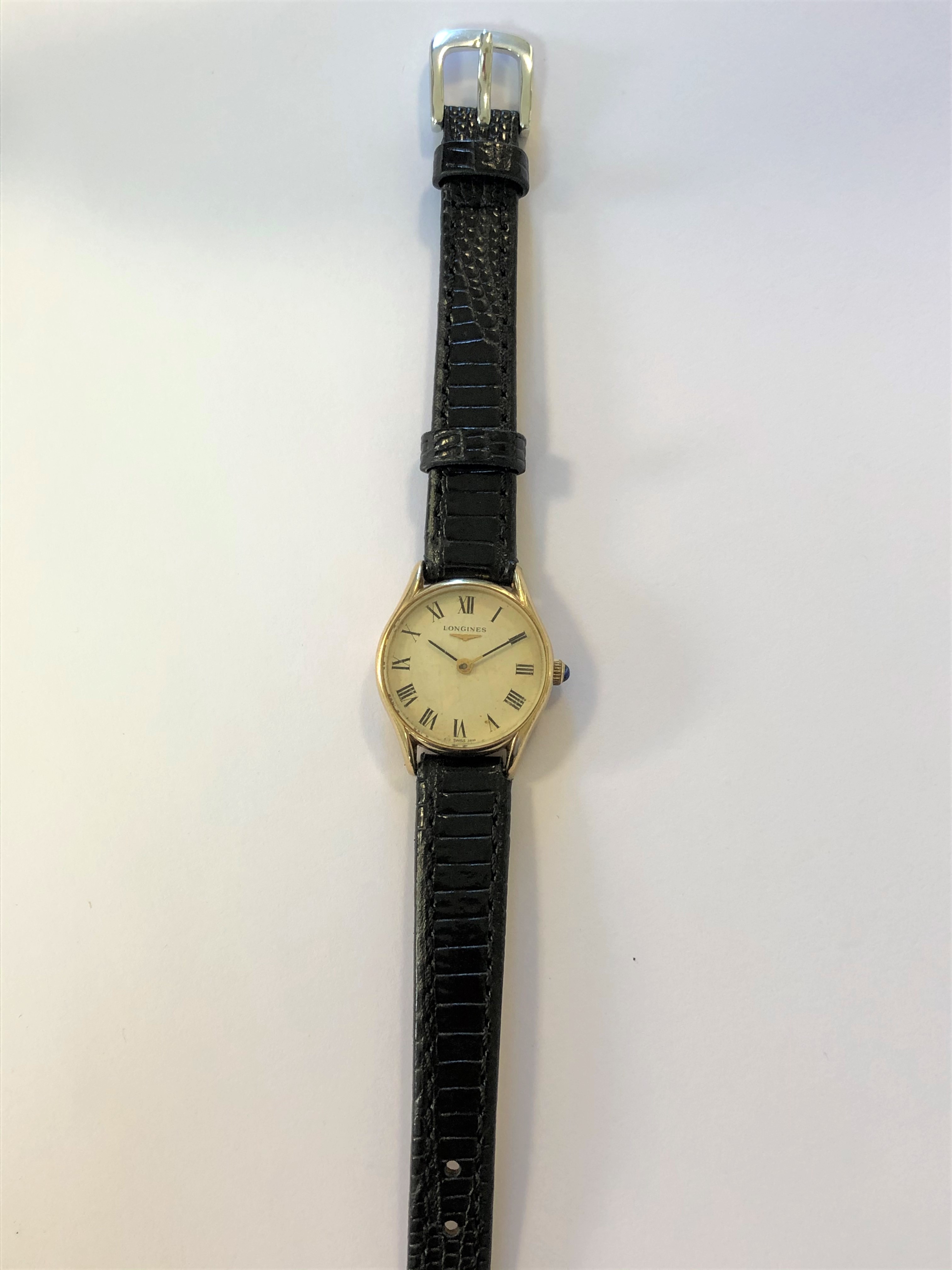 Longines - A lady's 9ct gold wristwatch,