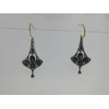 A pair of sapphire and diamond earpendants in the Edwardian taste,