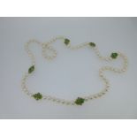A cultured pearl, jade and diamond necklace,