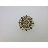 A ruby, diamond and seed pearl flower brooch,