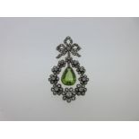 A Belle Époque peridot and diamond brooch,