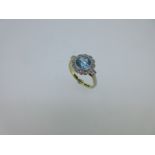A blue zircon and diamond cluster ring,