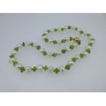 A peridot and cultured pearl necklace,