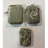 A trio of silver vesta cases,