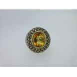 A modern citrine, smoky quartz and diamond bombé ring,