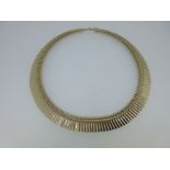 A 9ct gold Cleopatra style fringe necklace,