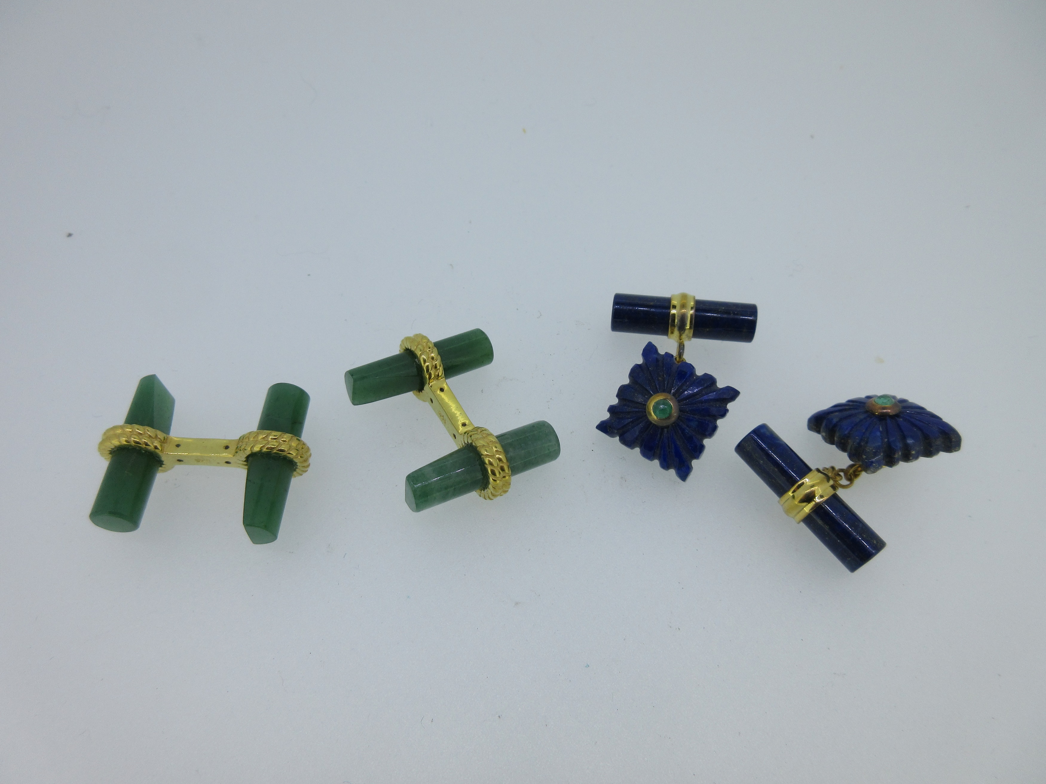 A pair of lapis lazuli and emerald cufflinks together with a pair of aventurine baton cufflinks,