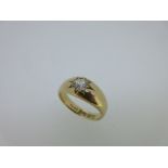 An 18ct gold and single stone diamond gypsy ring,