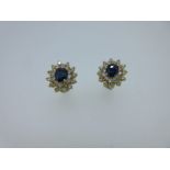 A pair of sapphire and diamond cluster earstuds,