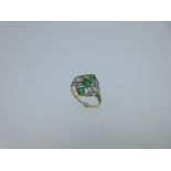 An unusual emerald and diamond ring circa 1920,