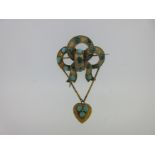 A Victorian turquoise set knot brooch with pendant heart,