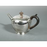 A Victorian silver bullet shaped bachelor's teapot,