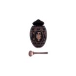 A pique tortoiseshell and rose coloured metal egg shaped snuff box and spoon,