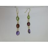 A pair of garnet, peridot and amethyst earpendants,