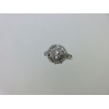 A diamond cluster ring,