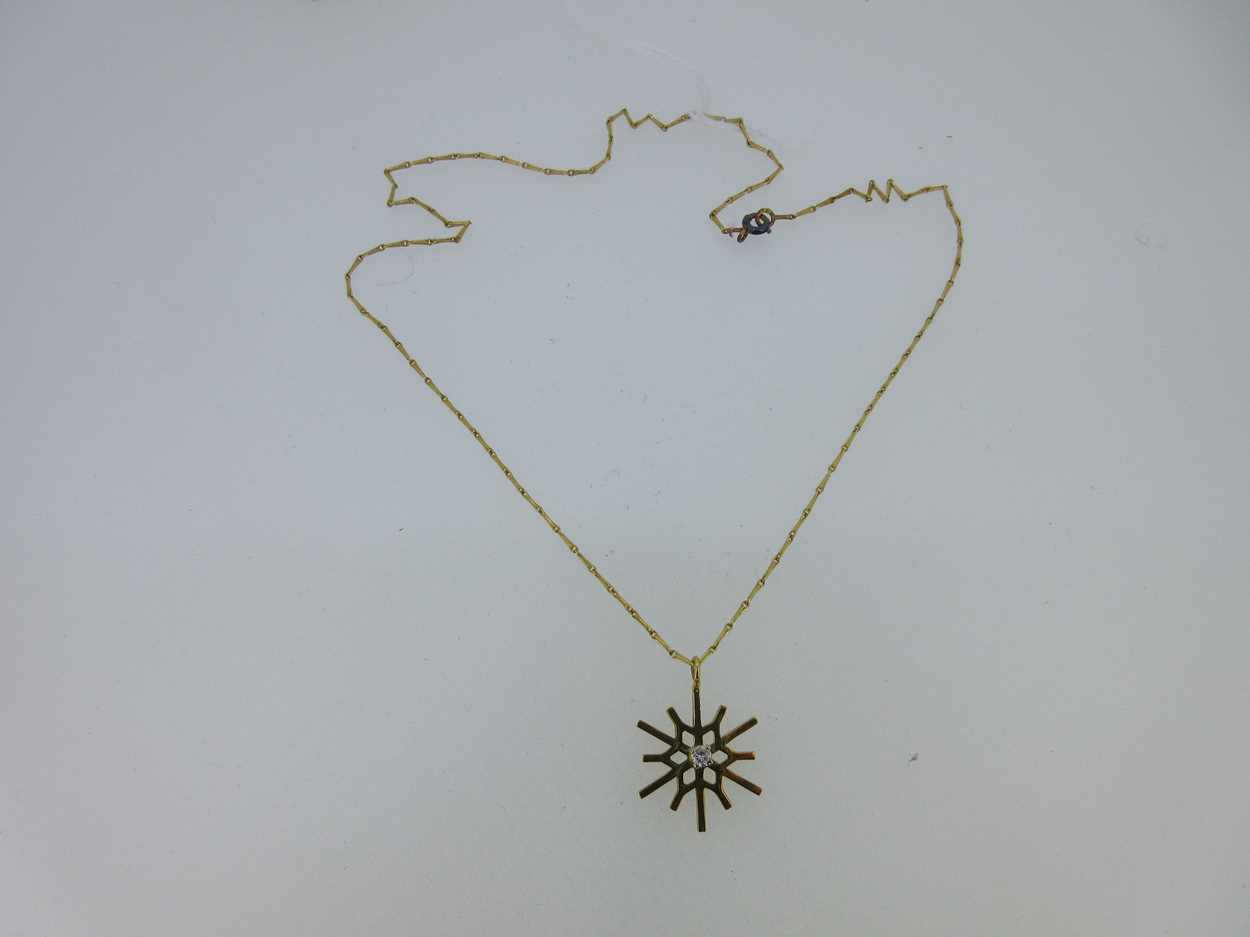 An 18ct gold diamond set snowflake pendant, - Image 2 of 4