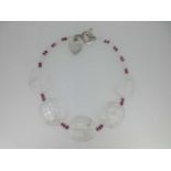 A rock crystal and red tourmaline necklace,