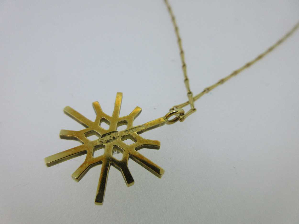 An 18ct gold diamond set snowflake pendant, - Image 3 of 4