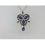 An amethyst, diamond and seed pearl trefoil pendant with chain,