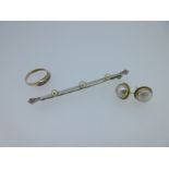 A diamond and cultured pearl bar brooch and two more pearl and gold pieces,