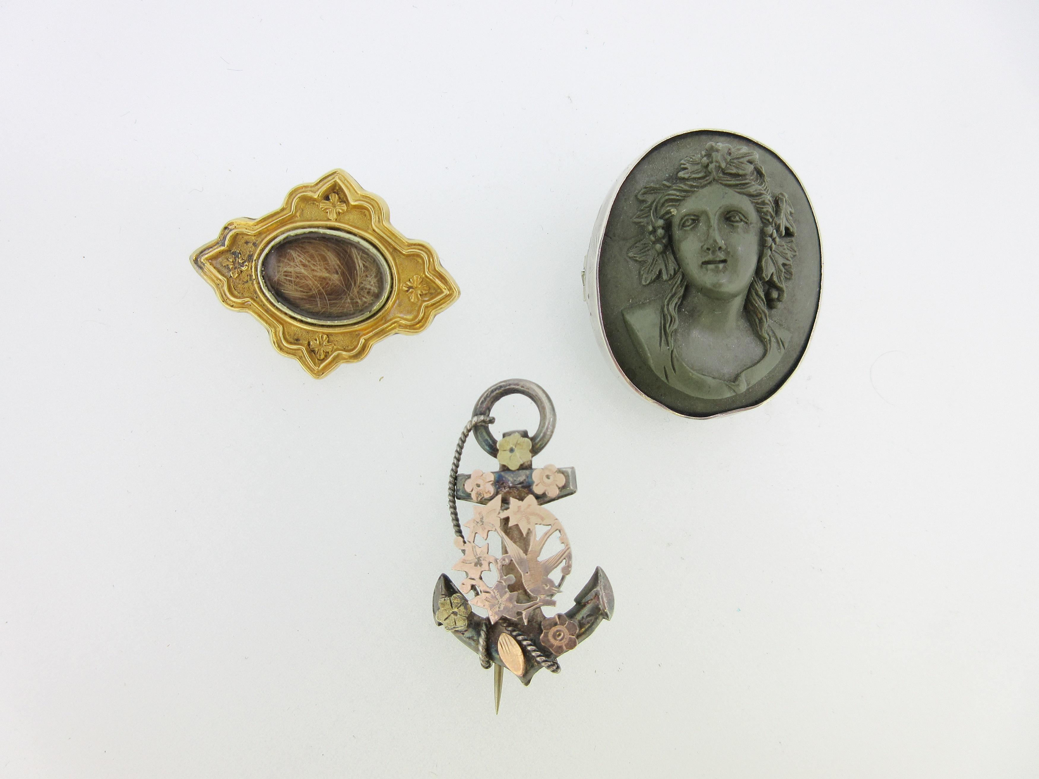 A William IV memorial brooch and two other antique brooches,