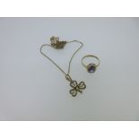 A seed pearl shamrock pendant and an amethyst and seed pearl ring,