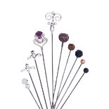 A collection of Edward VII silver topped hat-pins by Charles Horner,