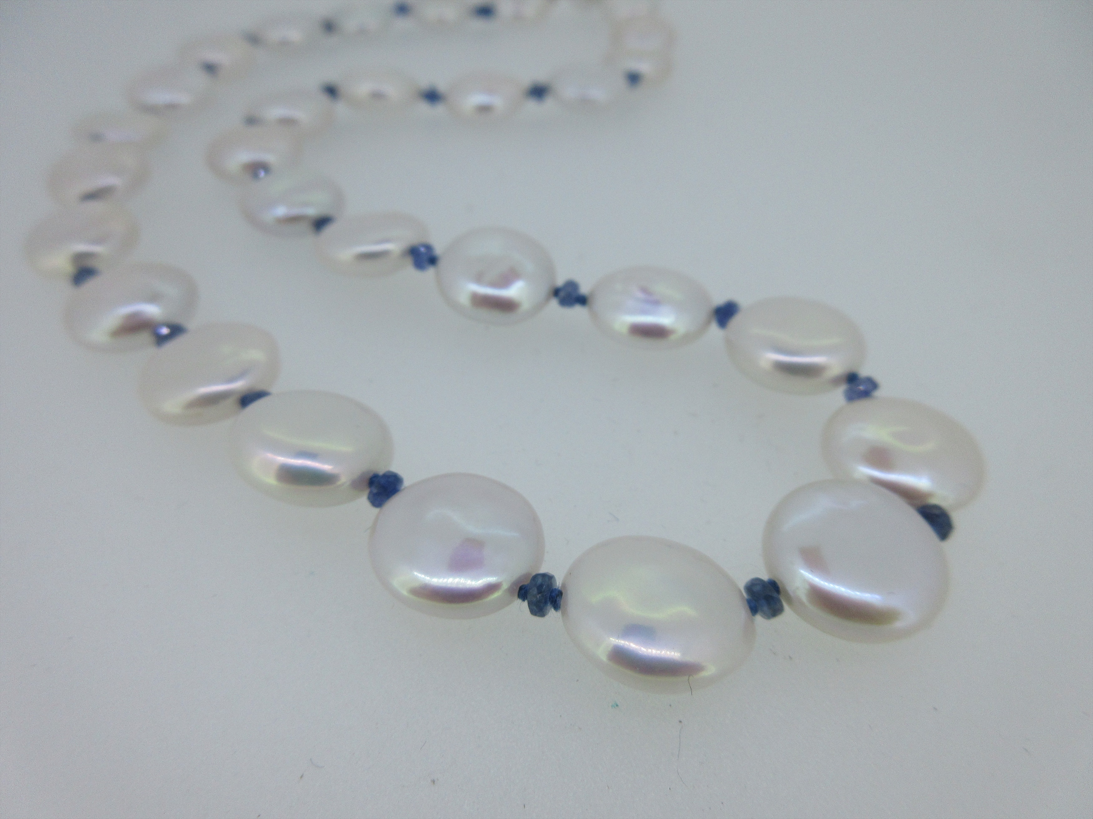 A sapphire and cultured pearl necklace,