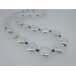 A sapphire and cultured pearl necklace,