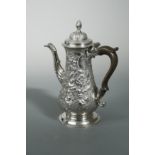 A George III silver coffee pot,