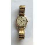 Omega - A gentleman's 9ct gold wristwatch,