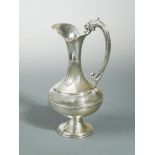 A Geek metalwares wine ewer,