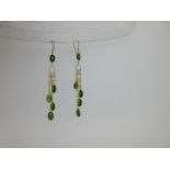 A pair of green diopside earpendants,