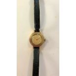 Longines - A lady's 9ct gold wristwatch,