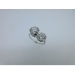 An impressive two stone diamond ring,