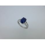 A modern sapphire and diamond ring,