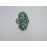An emerald and diamond plaque ring,