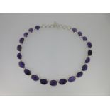 A contemporary amethyst rivière necklace,