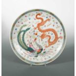 Dragon and exotic bird dish; together with a similar bowl (2)