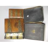 A collection of three 19th century walnut and brass bound stationery boxes in the gothic style