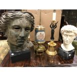 Two modern reproduction classical head busts on stands; a French style painted porcelain base
