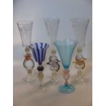 An early 20th century Venetian tall blue wine glass; together with four other glasses (5)