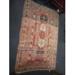 A Caucasian carpet 200 x 126cm