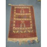 An Ersari red ground rug,