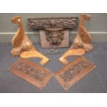 Pair of oak carved cherub wall brackets; a frieze panel; and a cherub mask wall bracket (4)