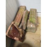 Assorted red stone architectural pilaster etc elements (9)