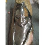 A large Zimbabwean carved hardstone part relief figure, 101cm high