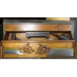 A good collection of antique moulding planes and other woodworking tools contained within two pine