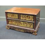 A Chinese small carved chest of drawers 53 x 65 x 49.5cm