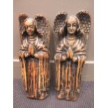 A pair of softwood carved angels